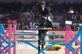 10/11/2024 - Marcus Ehning riding Coolio 42 in action during CSI5*- W Longines FEI Jumping World Cup 2024 Gran Prix presented by KASK, at Pala Fimauto on November 10, 2024, Verona, Italy. - CSI5*-W LONGINES FEI WORLD CUP™ PRESENTED BY KASK GRAN PRIX - INTERNAZIONALI - EQUITAZIONE