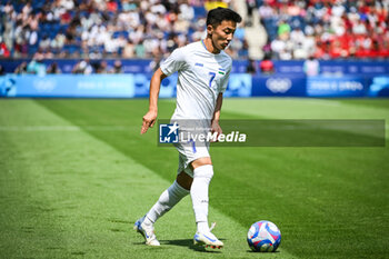 2024-07-24 - FAYZULLAEV Abbosbek of Uzbekistan during the football match between Uzbekistan and Spain, Olympic Games Paris 2024 on 24 July 2024 at Parc des Princes stadium in Paris, France - OLYMPIC GAMES PARIS 2024 - 24/07 - OLYMPIC GAMES PARIS 2024 - OLYMPIC GAMES