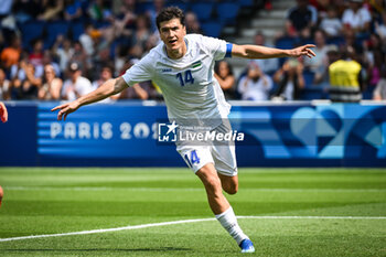 2024-07-24 - SHOMURODOV Eldor of Uzbekistan celebrates his goal during the football match between Uzbekistan and Spain, Olympic Games Paris 2024 on 24 July 2024 at Parc des Princes stadium in Paris, France - OLYMPIC GAMES PARIS 2024 - 24/07 - OLYMPIC GAMES PARIS 2024 - OLYMPIC GAMES