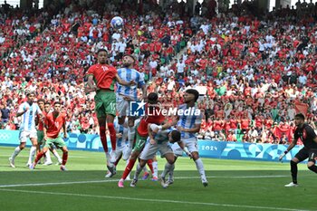 2024-07-24 - Amir Richardson of Morocco and Nicolas Otamendi of Argentina during the Football, Men's Group B, between Argentina and Morocco during the Olympic Games Paris 2024 on 24 July 2024 at Geoffroy-Guichard Stadium in Saint-Etienne, France - OLYMPIC GAMES PARIS 2024 - 24/07 - OLYMPIC GAMES PARIS 2024 - OLYMPIC GAMES