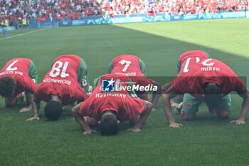 2024-07-24 - Illias Hakhomach of Morocco celebrates his goal with teammates during the Football, Men's Group B, between Argentina and Morocco during the Olympic Games Paris 2024 on 24 July 2024 at Geoffroy-Guichard Stadium in Saint-Etienne, France - OLYMPIC GAMES PARIS 2024 - 24/07 - OLYMPIC GAMES PARIS 2024 - OLYMPIC GAMES