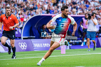 2024-07-24 - Rayan Rebbadj (France) scores a try, Rugby Sevens, Men's Pool C between France and United States during the Olympic Games Paris 2024 on 24 July 2024 at Stade de France in Saint-Denis, France - OLYMPIC GAMES PARIS 2024 - 24/07 - OLYMPIC GAMES PARIS 2024 - OLYMPIC GAMES