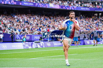 2024-07-24 - Rayan Rebbadj (France) scores a try, Rugby Sevens, Men's Pool C between France and United States during the Olympic Games Paris 2024 on 24 July 2024 at Stade de France in Saint-Denis, France - OLYMPIC GAMES PARIS 2024 - 24/07 - OLYMPIC GAMES PARIS 2024 - OLYMPIC GAMES