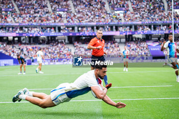 2024-07-24 - Rayan Rebbadj (France) scores a try, Rugby Sevens, Men's Pool C between France and United States during the Olympic Games Paris 2024 on 24 July 2024 at Stade de France in Saint-Denis, France - OLYMPIC GAMES PARIS 2024 - 24/07 - OLYMPIC GAMES PARIS 2024 - OLYMPIC GAMES