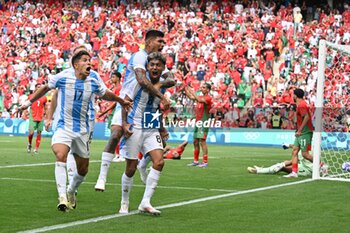 2024-07-24 - Cristian Medina (8) of Argentina celebrates a goal which was then cancelled by VAR during the Football, Men's Group B, between Argentina and Morocco during the Olympic Games Paris 2024 on 24 July 2024 at Geoffroy-Guichard Stadium in Saint-Etienne, France - OLYMPIC GAMES PARIS 2024 - 24/07 - OLYMPIC GAMES PARIS 2024 - OLYMPIC GAMES