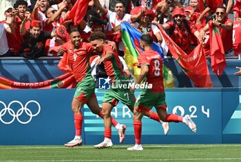 2024-07-24 - Soufiane Rahima of Morocco celebrates a goal during the Football, Men's Group B, between Argentina and Morocco during the Olympic Games Paris 2024 on 24 July 2024 at Geoffroy-Guichard Stadium in Saint-Etienne, France - OLYMPIC GAMES PARIS 2024 - 24/07 - OLYMPIC GAMES PARIS 2024 - OLYMPIC GAMES