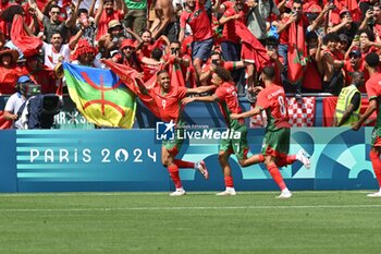 2024-07-24 - Soufiane Rahima of Morocco celebrates a goal during the Football, Men's Group B, between Argentina and Morocco during the Olympic Games Paris 2024 on 24 July 2024 at Geoffroy-Guichard Stadium in Saint-Etienne, France - OLYMPIC GAMES PARIS 2024 - 24/07 - OLYMPIC GAMES PARIS 2024 - OLYMPIC GAMES