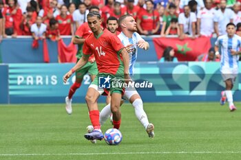 2024-07-24 - Oussama Targhalline of Morocco during the Football, Men's Group B, between Argentina and Morocco during the Olympic Games Paris 2024 on 24 July 2024 at Geoffroy-Guichard Stadium in Saint-Etienne, France - OLYMPIC GAMES PARIS 2024 - 24/07 - OLYMPIC GAMES PARIS 2024 - OLYMPIC GAMES