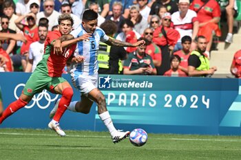 2024-07-24 - Bruno Amione of Argentina and Abde Ezzalzouli of Morocco during the Football, Men's Group B, between Argentina and Morocco during the Olympic Games Paris 2024 on 24 July 2024 at Geoffroy-Guichard Stadium in Saint-Etienne, France - OLYMPIC GAMES PARIS 2024 - 24/07 - OLYMPIC GAMES PARIS 2024 - OLYMPIC GAMES