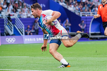 2024-07-24 - Antoine Dupont (France) scores a try, Rugby Sevens, Men's Pool C between France and Uruguay during the Olympic Games Paris 2024 on 24 July 2024 at Stade de France in Saint-Denis, France - OLYMPIC GAMES PARIS 2024 - 24/07 - OLYMPIC GAMES PARIS 2024 - OLYMPIC GAMES