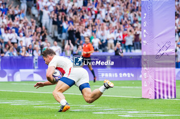 2024-07-24 - Antoine Dupont (France) scores a try, Rugby Sevens, Men's Pool C between France and Uruguay during the Olympic Games Paris 2024 on 24 July 2024 at Stade de France in Saint-Denis, France - OLYMPIC GAMES PARIS 2024 - 24/07 - OLYMPIC GAMES PARIS 2024 - OLYMPIC GAMES