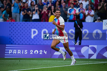 2024-07-24 - Aaron Grandidier Nkanang (France), Rugby Sevens, Men's Pool C between France and Uruguay during the Olympic Games Paris 2024 on 24 July 2024 at Stade de France in Saint-Denis, France - OLYMPIC GAMES PARIS 2024 - 24/07 - OLYMPIC GAMES PARIS 2024 - OLYMPIC GAMES