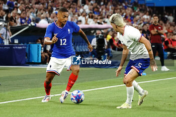 2024-07-24 - Enzo Millot (France) and John Tolkin (USA) during the Football, Men's Group A, between France and United States during the Olympic Games Paris 2024 on 24 July 2024 at Geoffroy-Guichard Stadium in Marseille, France - OLYMPIC GAMES PARIS 2024 - 24/07 - OLYMPIC GAMES PARIS 2024 - OLYMPIC GAMES