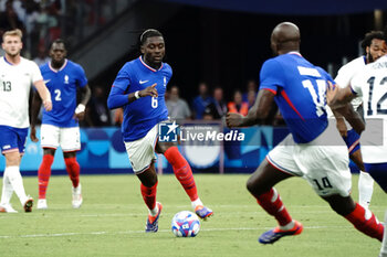 2024-07-24 - Manu Koné (France) during the Football, Men's Group A, between France and United States during the Olympic Games Paris 2024 on 24 July 2024 at Geoffroy-Guichard Stadium in Marseille, France - OLYMPIC GAMES PARIS 2024 - 24/07 - OLYMPIC GAMES PARIS 2024 - OLYMPIC GAMES