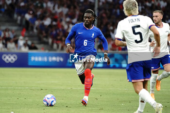 2024-07-24 - Manu Koné (France) during the Football, Men's Group A, between France and United States during the Olympic Games Paris 2024 on 24 July 2024 at Geoffroy-Guichard Stadium in Marseille, France - OLYMPIC GAMES PARIS 2024 - 24/07 - OLYMPIC GAMES PARIS 2024 - OLYMPIC GAMES