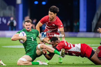 2024-07-24 - Jack Kelly (Ireland) and Kippei Taniaka (Japan), Rugby Sevens, Men's Pool A between Ireland and Japan during the Olympic Games Paris 2024 on 24 July 2024 at Stade de France in Saint-Denis, France - OLYMPIC GAMES PARIS 2024 - 24/07 - OLYMPIC GAMES PARIS 2024 - OLYMPIC GAMES