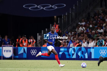 2024-07-24 - Castello Lukeba (France) during the Football, Men's Group A, between France and United States during the Olympic Games Paris 2024 on 24 July 2024 at Geoffroy-Guichard Stadium in Marseille, France - OLYMPIC GAMES PARIS 2024 - 24/07 - OLYMPIC GAMES PARIS 2024 - OLYMPIC GAMES