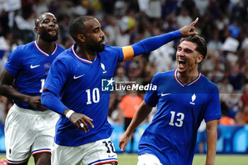 2024-07-24 - Alexandre Lacazette (France) celebrates his goal during the Football, Men's Group A, between France and United States during the Olympic Games Paris 2024 on 24 July 2024 at Geoffroy-Guichard Stadium in Marseille, France - OLYMPIC GAMES PARIS 2024 - 24/07 - OLYMPIC GAMES PARIS 2024 - OLYMPIC GAMES