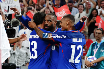 2024-07-24 - Alexandre Lacazette (France) celebrates his goal with teammates during the Football, Men's Group A, between France and United States during the Olympic Games Paris 2024 on 24 July 2024 at Geoffroy-Guichard Stadium in Marseille, France - OLYMPIC GAMES PARIS 2024 - 24/07 - OLYMPIC GAMES PARIS 2024 - OLYMPIC GAMES