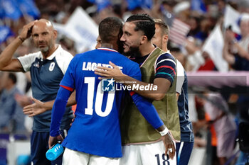 2024-07-24 - Alexandre Lacazette (France) celebrates his goal with Rayan Cherki during the Football, Men's Group A, between France and United States during the Olympic Games Paris 2024 on 24 July 2024 at Geoffroy-Guichard Stadium in Marseille, France - OLYMPIC GAMES PARIS 2024 - 24/07 - OLYMPIC GAMES PARIS 2024 - OLYMPIC GAMES