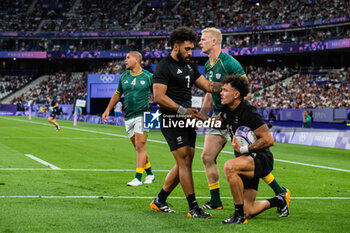 2024-07-24 - Moses Leo (New Zealand) celebrates a try with Fehi Fineanganofo, Rugby Sevens, Men's Pool A between New Zealand and South Africa during the Olympic Games Paris 2024 on 24 July 2024 at Stade de France in Saint-Denis, France - OLYMPIC GAMES PARIS 2024 - 24/07 - OLYMPIC GAMES PARIS 2024 - OLYMPIC GAMES