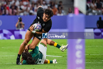 2024-07-24 - Moses Leo (New Zealand) and Roscko Speckman (South Africa), Rugby Sevens, Men's Pool A between New Zealand and South Africa during the Olympic Games Paris 2024 on 24 July 2024 at Stade de France in Saint-Denis, France - OLYMPIC GAMES PARIS 2024 - 24/07 - OLYMPIC GAMES PARIS 2024 - OLYMPIC GAMES