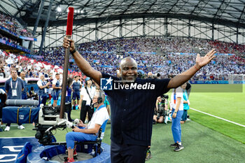 2024-07-24 - France and Marseille former player Basile Boli during the Football, Men's Group A, between France and United States during the Olympic Games Paris 2024 on 24 July 2024 at Velodrome Stadium in Marseille, France - OLYMPIC GAMES PARIS 2024 - 24/07 - OLYMPIC GAMES PARIS 2024 - OLYMPIC GAMES