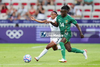 2024-07-26 - Crystal Dunn (USA) and Prisca Chilufya (Zambia), Football, Women's Group B between United States and Zambia during the Olympic Games Paris 2024 on 25 July 2024 at Allianz Riviera in Nice, France - OLYMPIC GAMES PARIS 2024 - 25/07 - OLYMPIC GAMES PARIS 2024 - OLYMPIC GAMES