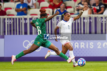 2024-07-26 - Crystal Dunn (USA) and Rhoda Chileshe (Zambia), Football, Women's Group B between United States and Zambia during the Olympic Games Paris 2024 on 25 July 2024 at Allianz Riviera in Nice, France - OLYMPIC GAMES PARIS 2024 - 25/07 - OLYMPIC GAMES PARIS 2024 - OLYMPIC GAMES