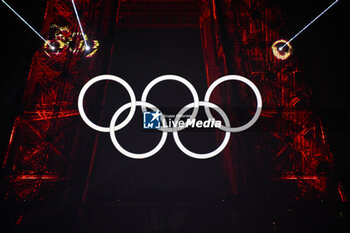 2024-07-26 - Olympic rings on the Eiffel Tower, Opening Ceremony during the Olympic Games Paris 2024 on 26 July 2024 in Paris, France - OLYMPIC GAMES PARIS 2024 - OPENING CEREMONY - 26/07 - OLYMPIC GAMES PARIS 2024 - OLYMPIC GAMES