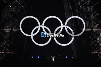 2024-07-26 - Olympic rings on the Eiffel Tower, Opening Ceremony during the Olympic Games Paris 2024 on 26 July 2024 in Paris, France - OLYMPIC GAMES PARIS 2024 - OPENING CEREMONY - 26/07 - OLYMPIC GAMES PARIS 2024 - OLYMPIC GAMES