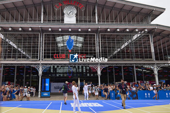 2024-07-26 - Olympic Torch Relay during the opening ceremony of the Olympic Games Paris 2024 on 26 July 2024 in Paris, France - OLYMPIC GAMES PARIS 2024 - OPENING CEREMONY - 26/07 - OLYMPIC GAMES PARIS 2024 - OLYMPIC GAMES