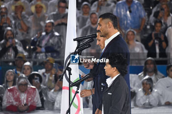 2024-07-26 - Florent Manaudou and Melina Robert Michon take the athletes' Olympic oath, Opening Ceremony during the Olympic Games Paris 2024 on 26 July 2024 in Paris, France - OLYMPIC GAMES PARIS 2024 - OPENING CEREMONY - 26/07 - OLYMPIC GAMES PARIS 2024 - OLYMPIC GAMES