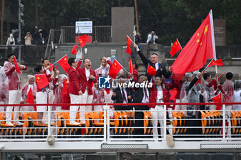 2024-07-26 - Team China parade, Opening Ceremony during the Olympic Games Paris 2024 on 26 July 2024 in Paris, France - OLYMPIC GAMES PARIS 2024 - OPENING CEREMONY - 26/07 - OLYMPIC GAMES PARIS 2024 - OLYMPIC GAMES