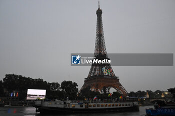 2024-07-26 - Olympic rings on the Eiffel Tower, Opening Ceremony during the Olympic Games Paris 2024 on 26 July 2024 in Paris, France - OLYMPIC GAMES PARIS 2024 - OPENING CEREMONY - 26/07 - OLYMPIC GAMES PARIS 2024 - OLYMPIC GAMES