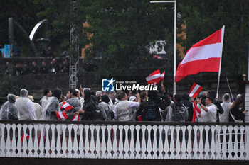 2024-07-26 - Team Austria parade, Opening Ceremony during the Olympic Games Paris 2024 on 26 July 2024 in Paris, France - OLYMPIC GAMES PARIS 2024 - OPENING CEREMONY - 26/07 - OLYMPIC GAMES PARIS 2024 - OLYMPIC GAMES