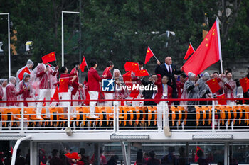 2024-07-26 - Team China parade, Opening Ceremony during the Olympic Games Paris 2024 on 26 July 2024 in Paris, France - OLYMPIC GAMES PARIS 2024 - OPENING CEREMONY - 26/07 - OLYMPIC GAMES PARIS 2024 - OLYMPIC GAMES