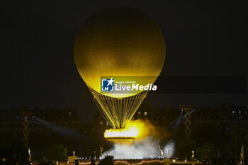 2024-07-26 - The cauldron, with the Olympic flame lit, lifting off attached to a balloon, Opening Ceremony during the Olympic Games Paris 2024 on 26 July 2024 in Paris, France - OLYMPIC GAMES PARIS 2024 - OPENING CEREMONY - 26/07 - OLYMPIC GAMES PARIS 2024 - OLYMPIC GAMES