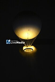 2024-07-26 - The cauldron, with the Olympic flame lit, lifting off attached to a balloon, Opening Ceremony during the Olympic Games Paris 2024 on 26 July 2024 in Paris, France - OLYMPIC GAMES PARIS 2024 - OPENING CEREMONY - 26/07 - OLYMPIC GAMES PARIS 2024 - OLYMPIC GAMES