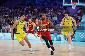 2024-07-27 - Lorenzo Brown of Spain and Josh Green of Australia, Basketball, Men's Group Phase - Group A between Australia and Spain during the Olympic Games Paris 2024 on 27 July 2024 in Villeneuve-d'Ascq near Lille, France - OLYMPIC GAMES PARIS 2024 - 27/07 - OLYMPIC GAMES PARIS 2024 - OLYMPIC GAMES