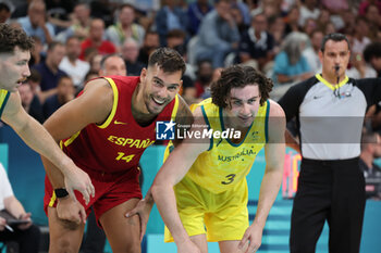 2024-07-27 - Willy Hernangómez of Spain and Josh Giddey of Australia, Basketball, Men's Group Phase - Group A between Australia and Spain during the Olympic Games Paris 2024 on 27 July 2024 in Villeneuve-d'Ascq near Lille, France - OLYMPIC GAMES PARIS 2024 - 27/07 - OLYMPIC GAMES PARIS 2024 - OLYMPIC GAMES