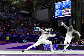 2024-07-27 - APITHY Bolade of France, SZATMARI Andras of Hungarian, Men's Sabre Individual Fencing during the Olympic Games Paris 2024 on 27 July 2024 at Le Grand Palais in Paris, France - OLYMPIC GAMES PARIS 2024 - 27/07 - OLYMPIC GAMES PARIS 2024 - OLYMPIC GAMES