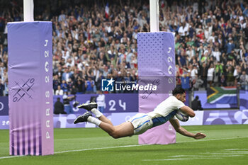 2024-07-27 - Rayan Rebbadj (France) scores a try, Rugby Sevens, Men's Semi-final between South Africa and and France during the Olympic Games Paris 2024 on 27 July 2024 at Stade de France in Saint-Denis, France - OLYMPIC GAMES PARIS 2024 - 27/07 - OLYMPIC GAMES PARIS 2024 - OLYMPIC GAMES