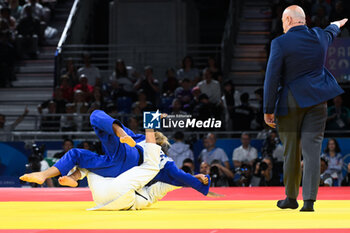 2024-07-27 - Shirine Boukli ( France ) vs Assunta Scutto ( Italy ), Judo, Women -48 kg Repechage contest during the Olympic Games Paris 2024 on 27 July 2024 at Arena Champ de Mars in Paris, France - OLYMPIC GAMES PARIS 2024 - 27/07 - OLYMPIC GAMES PARIS 2024 - OLYMPIC GAMES