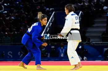 2024-07-27 - Shirine Boukli ( France ) vs Assunta Scutto ( Italy ), Judo, Women -48 kg Repechage contest during the Olympic Games Paris 2024 on 27 July 2024 at Arena Champ de Mars in Paris, France - OLYMPIC GAMES PARIS 2024 - 27/07 - OLYMPIC GAMES PARIS 2024 - OLYMPIC GAMES