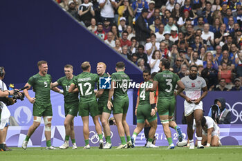 2024-07-27 - Terry Kennedy of Ireland celebrates a try with teammates, Rugby Sevens, Men's Placing 5-8 between Ireland and United States during the Olympic Games Paris 2024 on 27 July 2024 at Stade de France in Saint-Denis, France - OLYMPIC GAMES PARIS 2024 - 27/07 - OLYMPIC GAMES PARIS 2024 - OLYMPIC GAMES