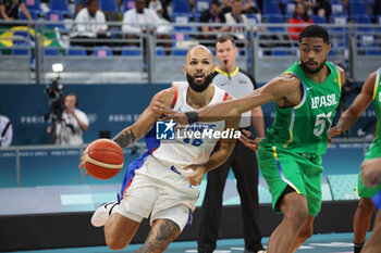 2024-07-27 - Evan Fournier of France and Bruno Caboclo of Brazil, Basketball, Men's Group Phase - Group B between France and Brazil during the Olympic Games Paris 2024 on 27 July 2024 in Villeneuve-d'Ascq near Lille, France - OLYMPIC GAMES PARIS 2024 - 27/07 - OLYMPIC GAMES PARIS 2024 - OLYMPIC GAMES