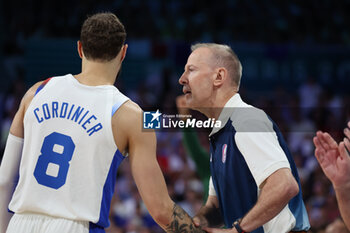 2024-07-27 - Coach Vincent Collet of France with Isaïa Cordinier, Basketball, Men's Group Phase - Group B between France and Brazil during the Olympic Games Paris 2024 on 27 July 2024 in Villeneuve-d'Ascq near Lille, France - OLYMPIC GAMES PARIS 2024 - 27/07 - OLYMPIC GAMES PARIS 2024 - OLYMPIC GAMES