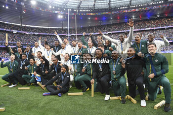 2024-07-27 - Players of France, Fiji and South Africa celebrate, Rugby Sevens, Men's final between France and Fiji during the Olympic Games Paris 2024 on 27 July 2024 at Stade de France in Saint-Denis, France - OLYMPIC GAMES PARIS 2024 - 27/07 - OLYMPIC GAMES PARIS 2024 - OLYMPIC GAMES