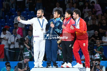 2024-07-27 - Luka Mkheidze ( FRA ) Silver, Yeldos Smetov ( KAZ ) Gold, Ryuju Nagamaya ( JPN ) and Francisco Garrigos ( ESP ) Bronze, Judo, Men -60 kg Final during the Olympic Games Paris 2024 on 27 July 2024 at Arena Champ de Mars in Paris, France - OLYMPIC GAMES PARIS 2024 - 27/07 - OLYMPIC GAMES PARIS 2024 - OLYMPIC GAMES